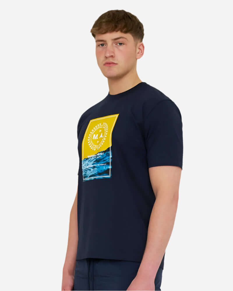 Marshall Artist CANUTE T Shirt Navy worn by model, featuring coastal graphic and modern street style design.