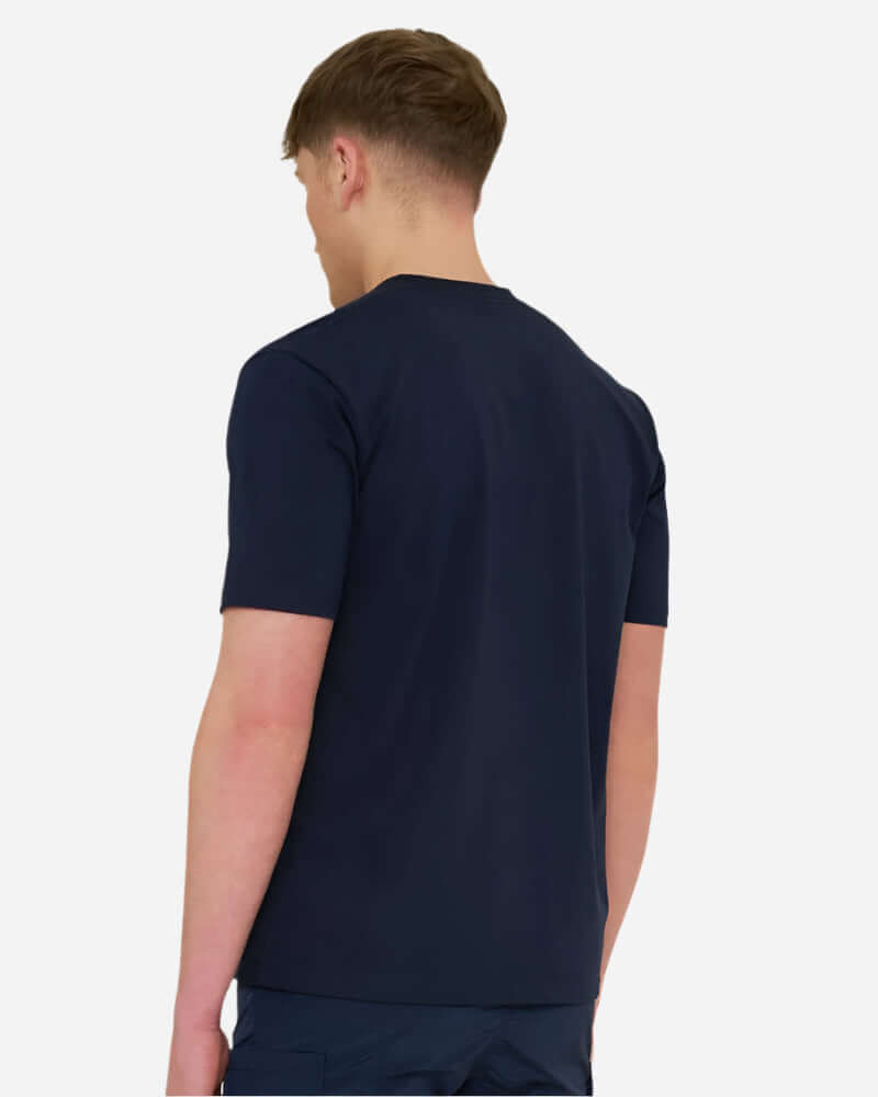 Model wearing the back of the Marshall Artist CANUTE T Shirt in navy, showcasing lightweight design and casual style.