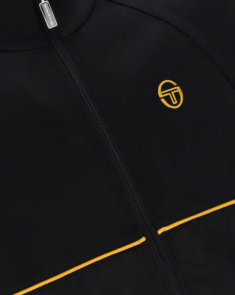 Sergio Tacchini NEW CATANIA Track Top Black/Gold close-up showing logo and zipper details