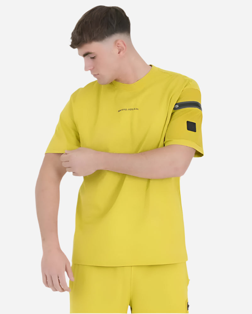 Peaceful Hooligan FORGE T Shirt in acid mustard with sleeve pocket, perfect for urban adventures.