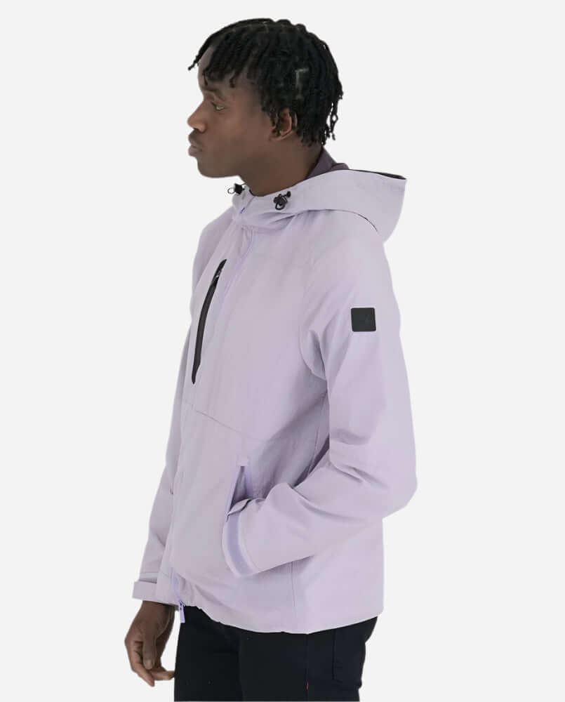 Peaceful Hooligan PISTOL Jacket in Lavendula on model, showcasing street style and weather-resistant features.