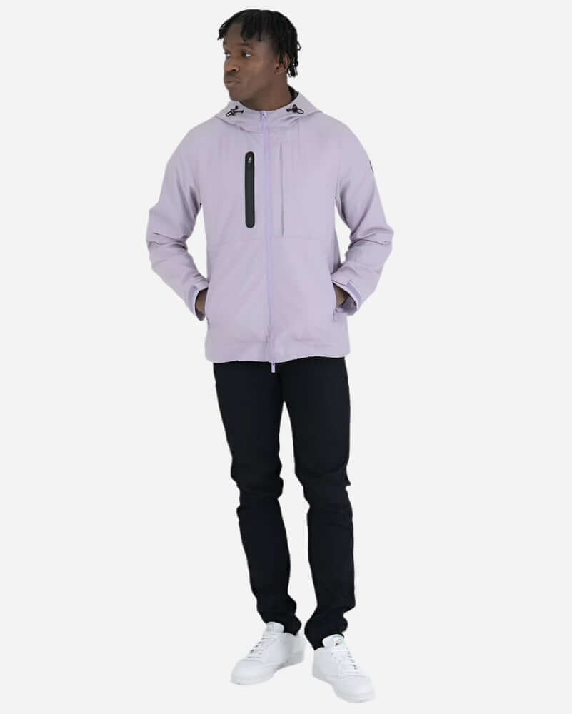 Model showcasing the Peaceful Hooligan PISTOL jacket in Lavendula color with casual black jeans.