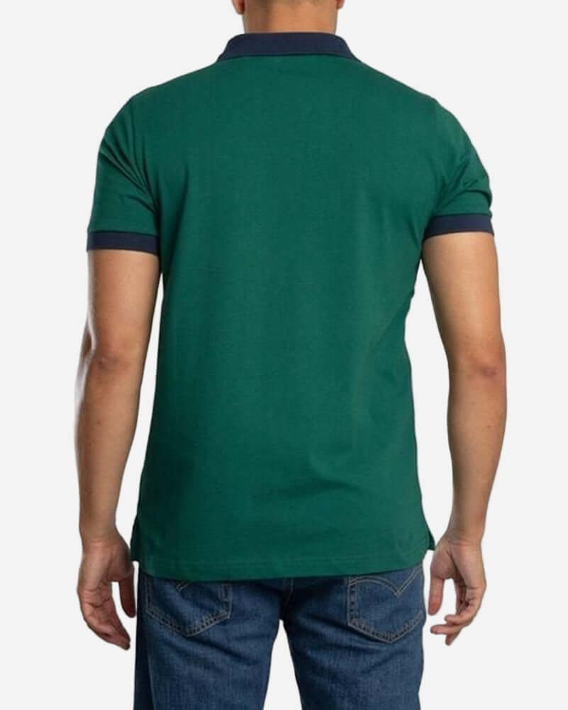Ellesse Lessepsia Polo Dark Green/Navy showing the back view with navy collar details and relaxed fit.