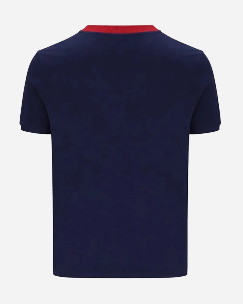 Back view of Sergio Tacchini SUPERMAC T Shirt in Maritime Blue with red collar trim.