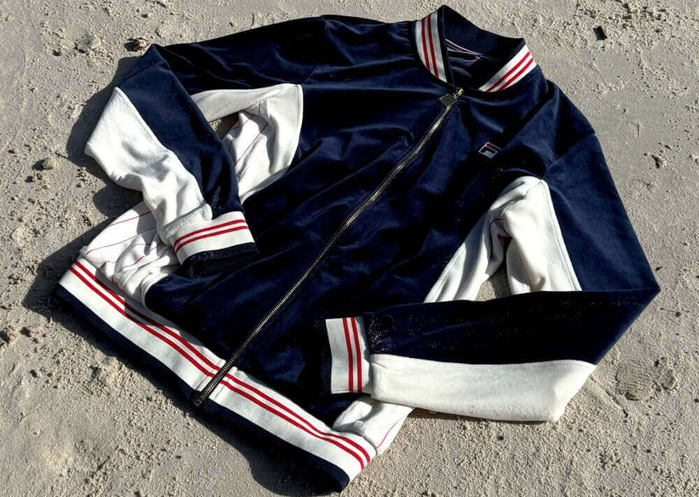 FILA Vintage classic sportswear jacket in navy and white with striped detailing on the sleeves.