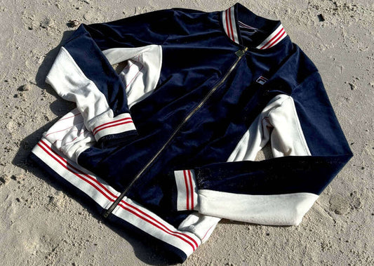 FILA Vintage classic sportswear jacket in navy and white with striped detailing on the sleeves.