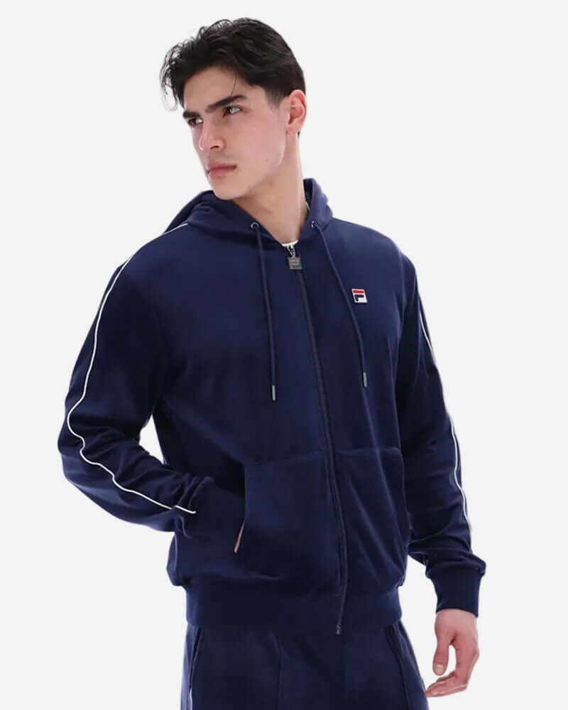 Fila Vintage ITALO Velour Hoodie Navy worn by a model, showcasing its luxurious feel and stylish design.