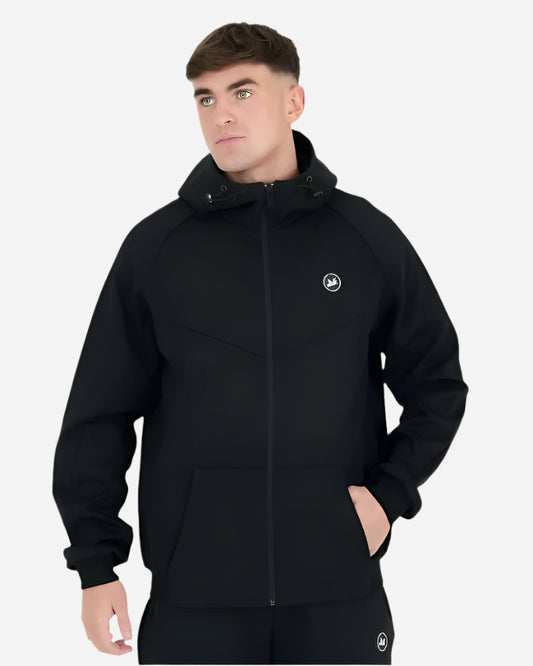 Model wearing the Peaceful Hooligan MADDOX Hoodie in black with adjustable hood and Civilian Uniform badge.