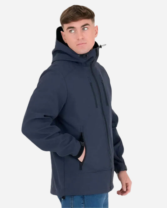Model wearing the Peaceful Hooligan MARKSMAN Softshell Jacket in Navy, showcasing its modern design and ergonomic hood.