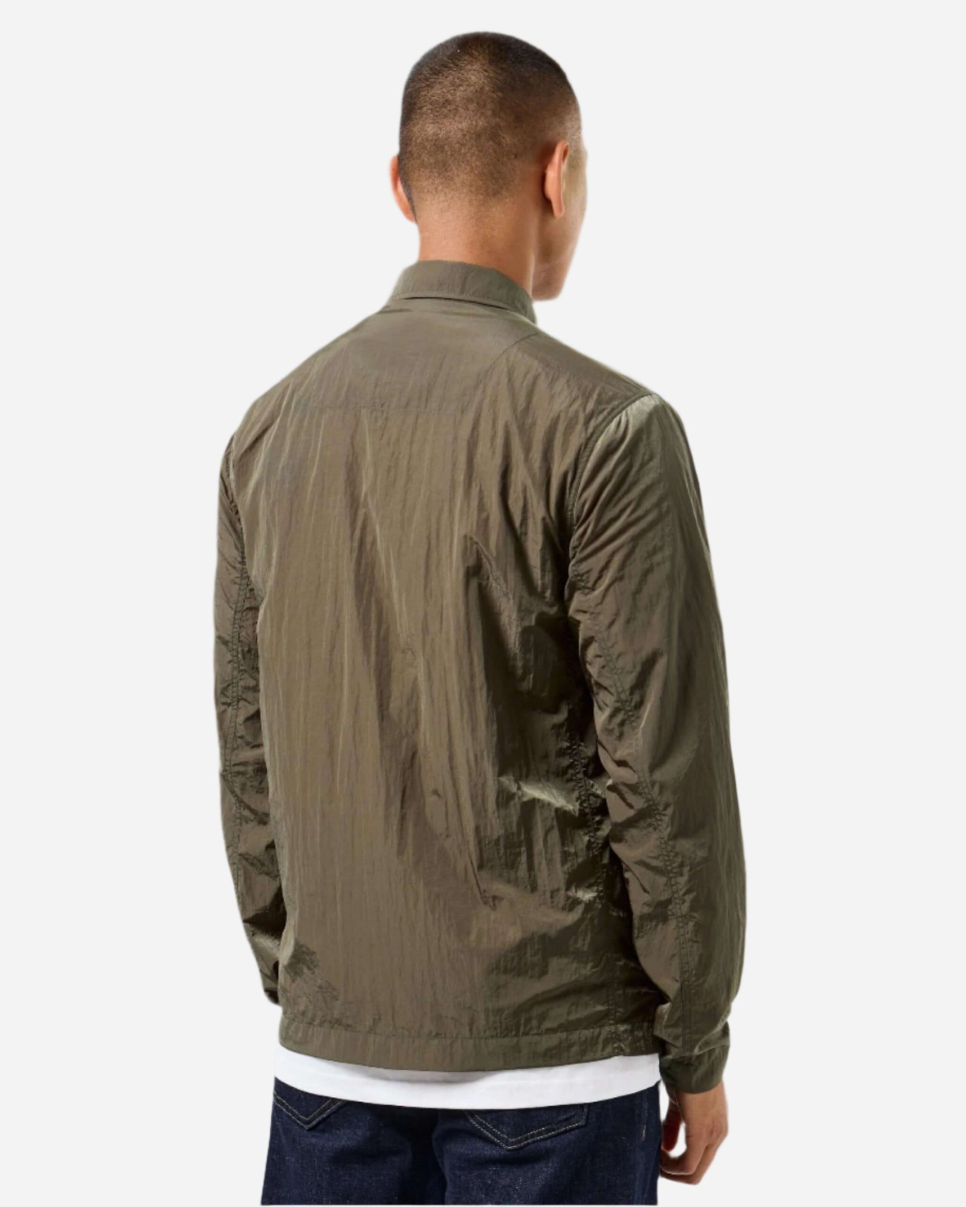 Back view of man wearing Weekend Offender PORTER Overshirt in Castle Green, lightweight and ideal for outdoor activities.