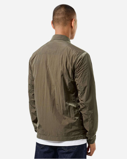 Back view of man wearing Weekend Offender PORTER Overshirt in Castle Green, lightweight and ideal for outdoor activities.